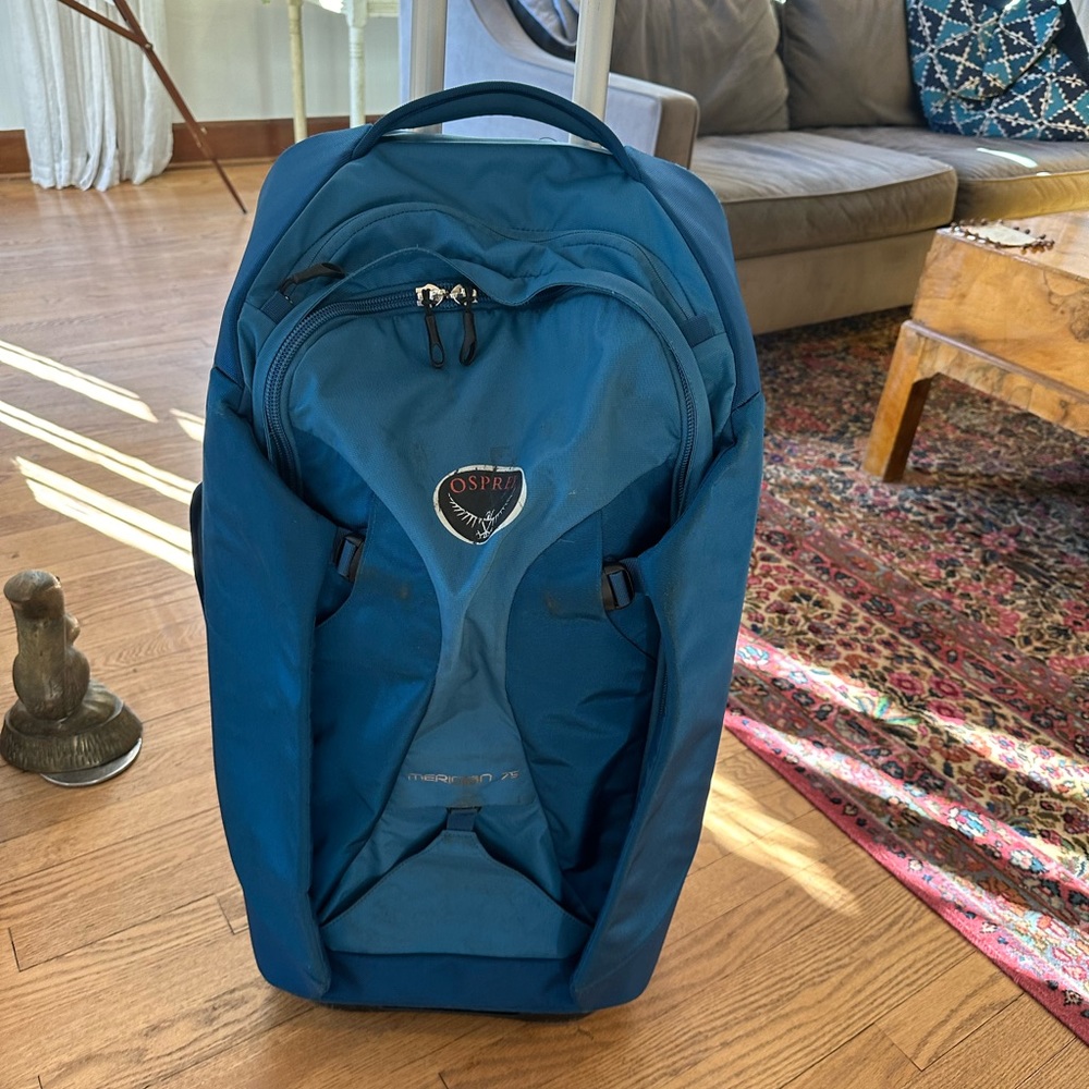 Osprey Meridian 75 roller bag with backpack option